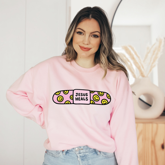 Jesus Heals bandaid